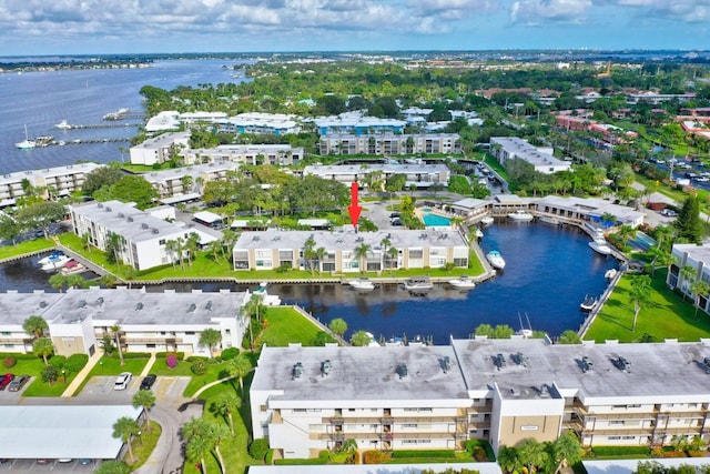 birds eye view of property featuring a water view