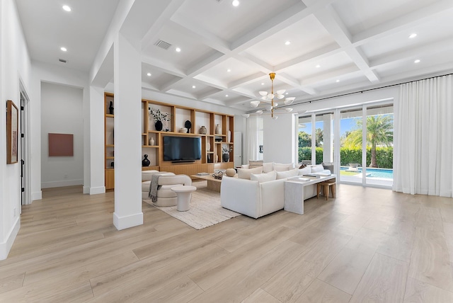 living room featuring beamed ceiling, light hardwood / wood-style floors, an inviting chandelier, and coffered ceiling