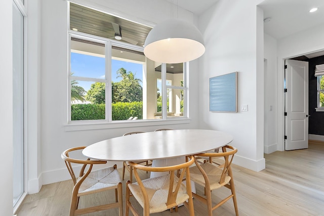 dining area featuring breakfast area and light hardwood / wood-style flooring