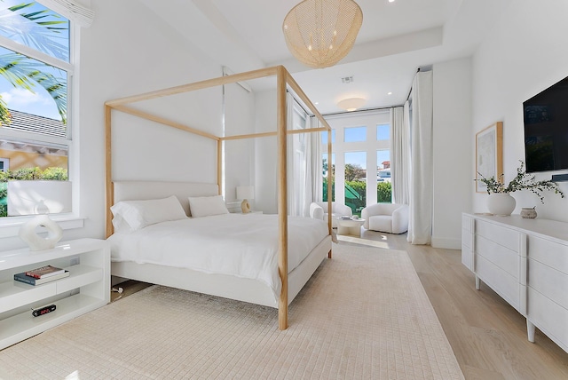 bedroom featuring light wood-type flooring