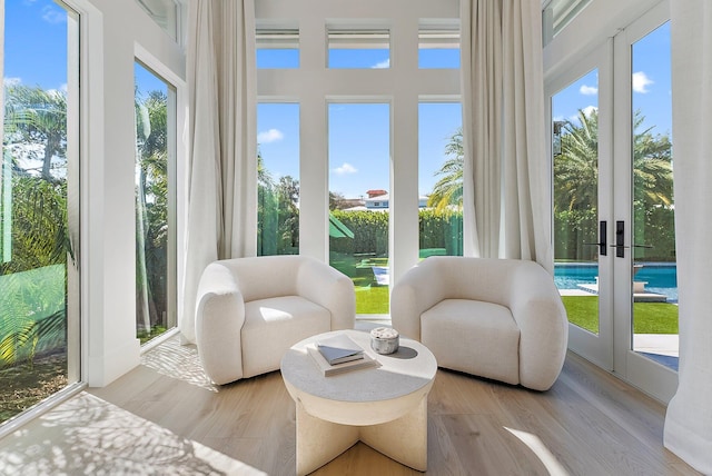 sunroom / solarium with french doors and plenty of natural light