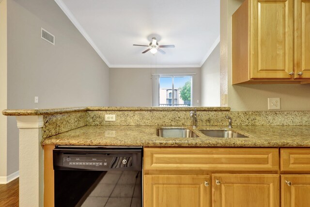 kitchen featuring black dishwasher, light stone counters, crown molding, and sink