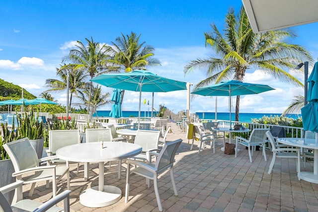 view of patio / terrace with a water view