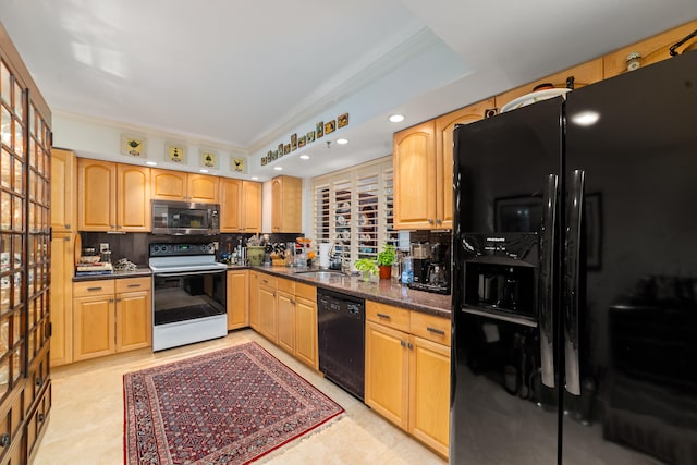 kitchen featuring backsplash, crown molding, sink, black appliances, and dark stone countertops