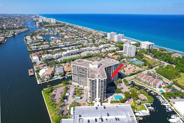 birds eye view of property featuring a water view