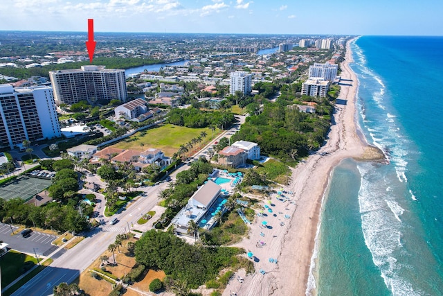 aerial view featuring a water view and a beach view