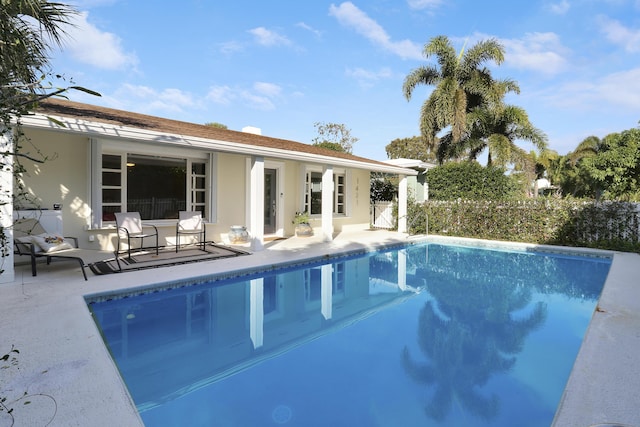 view of pool with a patio area