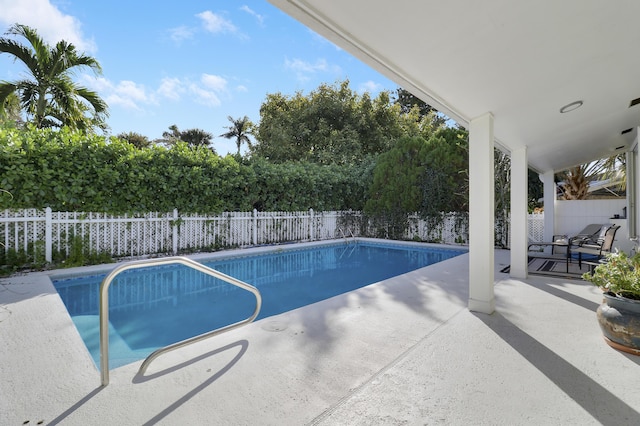 view of swimming pool featuring a patio