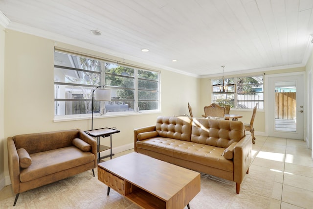 living room with plenty of natural light, light tile patterned floors, and ornamental molding