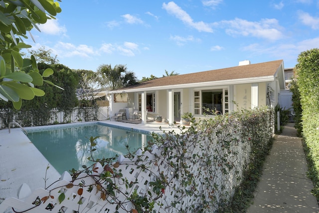 view of swimming pool featuring a patio area