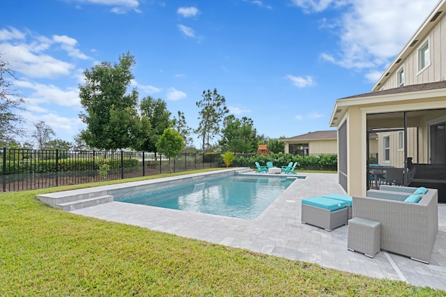 view of pool featuring a patio area and a lawn