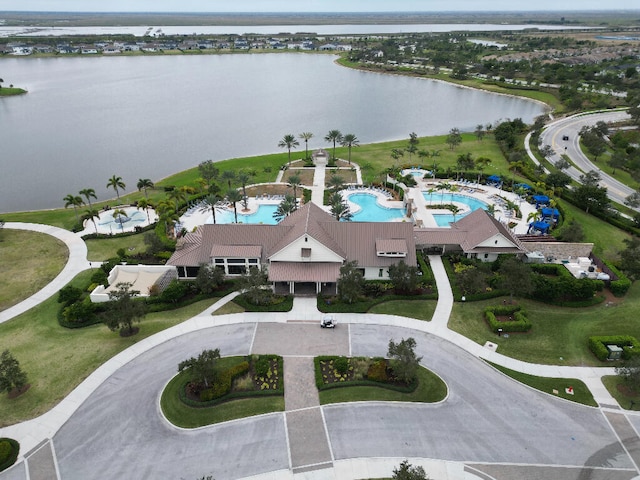 bird's eye view with a water view