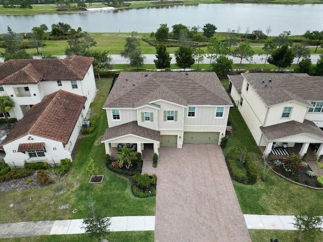 birds eye view of property featuring a water view