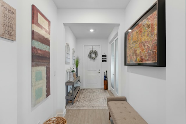 corridor featuring hardwood / wood-style flooring