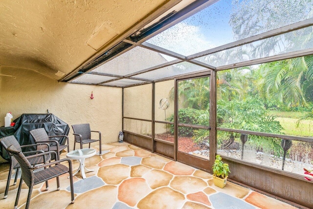 sunroom / solarium featuring a wealth of natural light