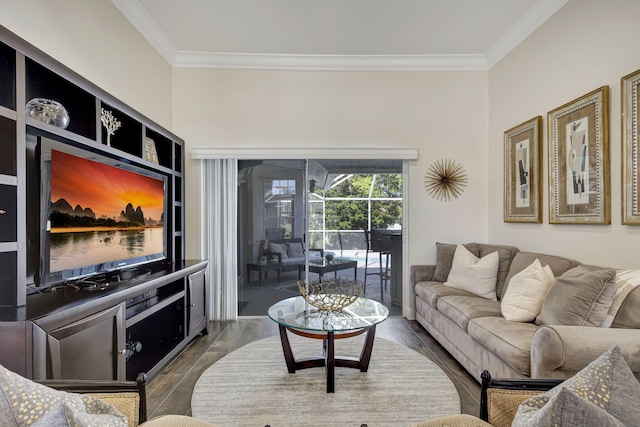 living room with dark hardwood / wood-style floors and crown molding