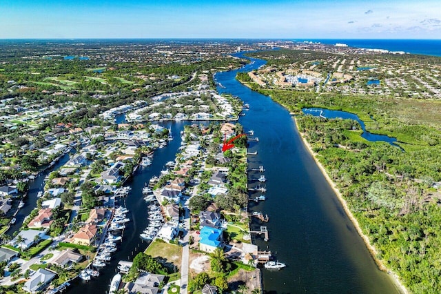 bird's eye view with a water view