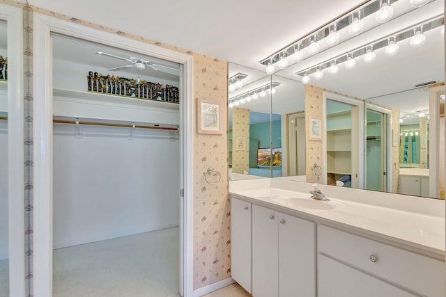 bathroom with vanity and ceiling fan