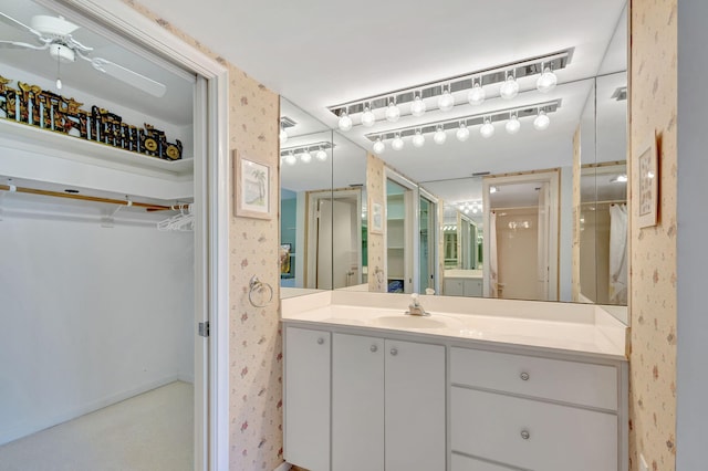 bathroom featuring vanity and ceiling fan