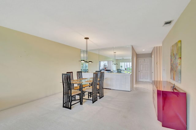 view of carpeted dining room