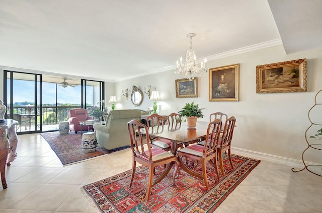 tiled dining room with ornamental molding, ceiling fan with notable chandelier, and a wall of windows