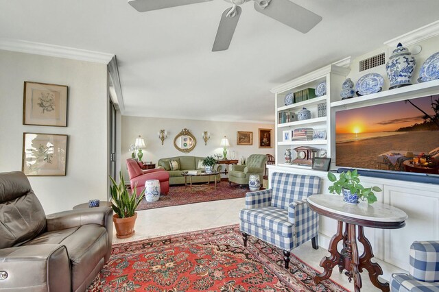 living room with ceiling fan, light tile patterned flooring, and ornamental molding