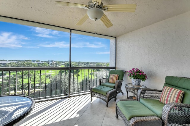 sunroom / solarium with ceiling fan and a healthy amount of sunlight