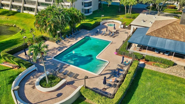 view of pool featuring a patio