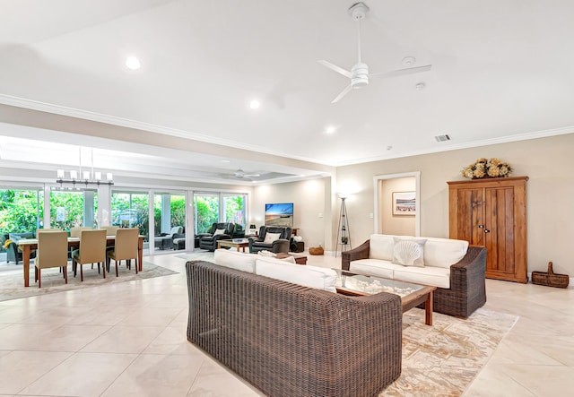 living room with ceiling fan, light tile patterned flooring, and ornamental molding