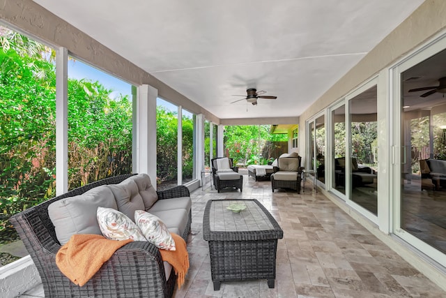 view of patio with ceiling fan and outdoor lounge area