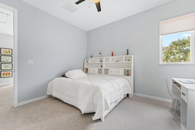 bedroom with light carpet and ceiling fan