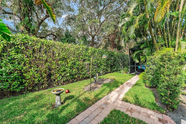 view of yard with a sunroom