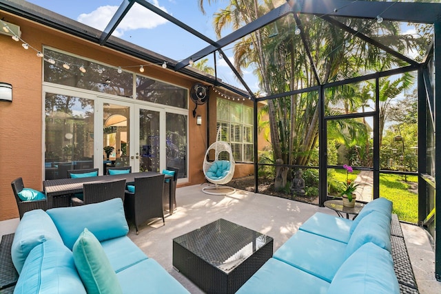 sunroom featuring french doors