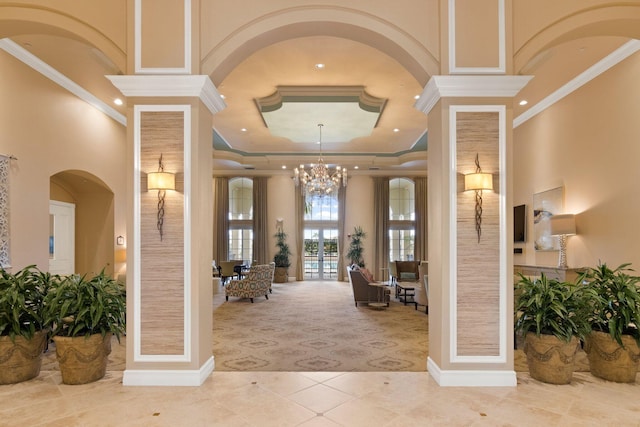 interior space with light colored carpet, crown molding, and a high ceiling