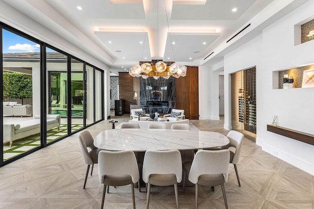 dining space with light parquet floors