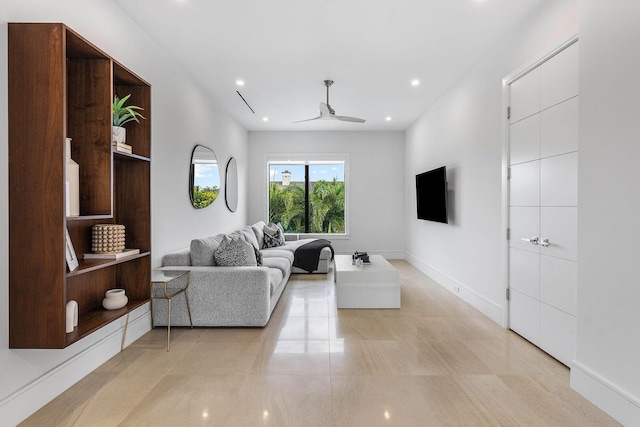 living room with ceiling fan