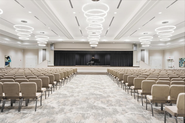 miscellaneous room with beam ceiling and light colored carpet