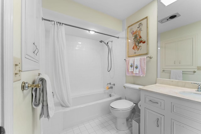 full bathroom featuring vanity, shower / bathtub combination with curtain, tile patterned floors, and toilet