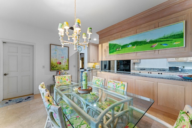 dining room featuring an inviting chandelier