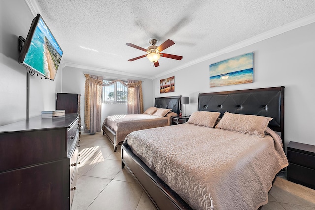 tiled bedroom with a textured ceiling, crown molding, and ceiling fan