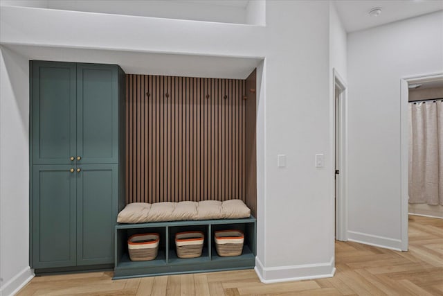 mudroom with light parquet flooring