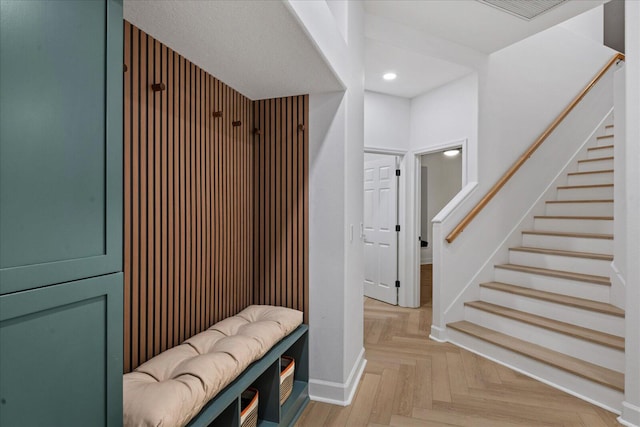 mudroom with light parquet flooring