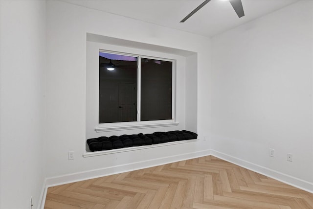 unfurnished room featuring parquet flooring