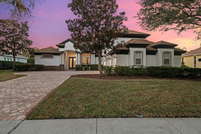 view of front of house with a lawn