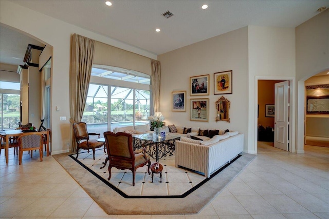 interior space with plenty of natural light and a towering ceiling