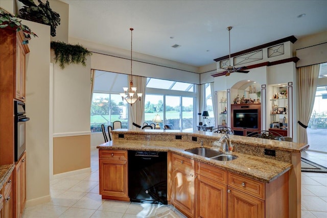 kitchen featuring ceiling fan with notable chandelier, sink, black appliances, pendant lighting, and light tile patterned floors