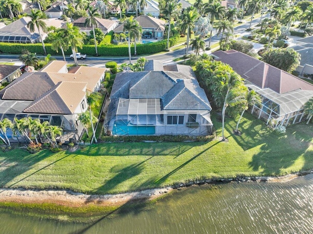 birds eye view of property featuring a water view