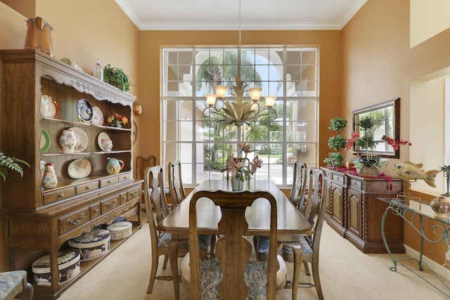 dining room featuring crown molding, plenty of natural light, light colored carpet, and a chandelier