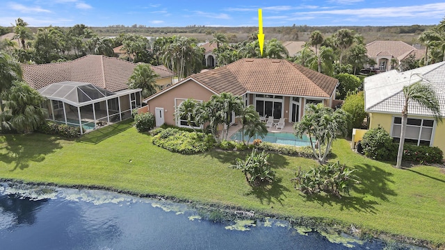 birds eye view of property featuring a water view