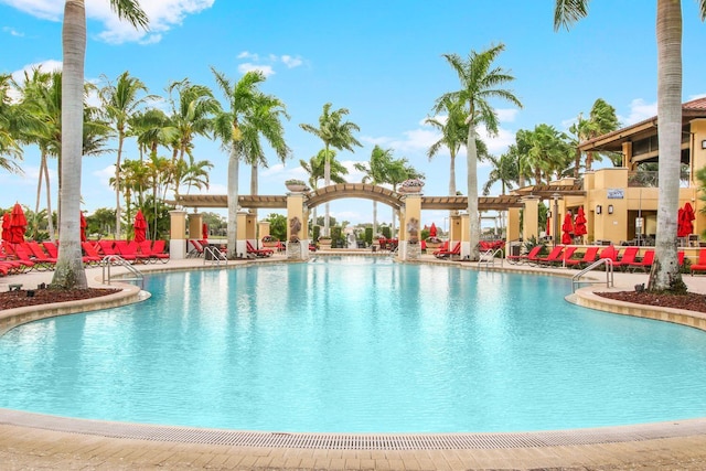 view of swimming pool featuring a pergola